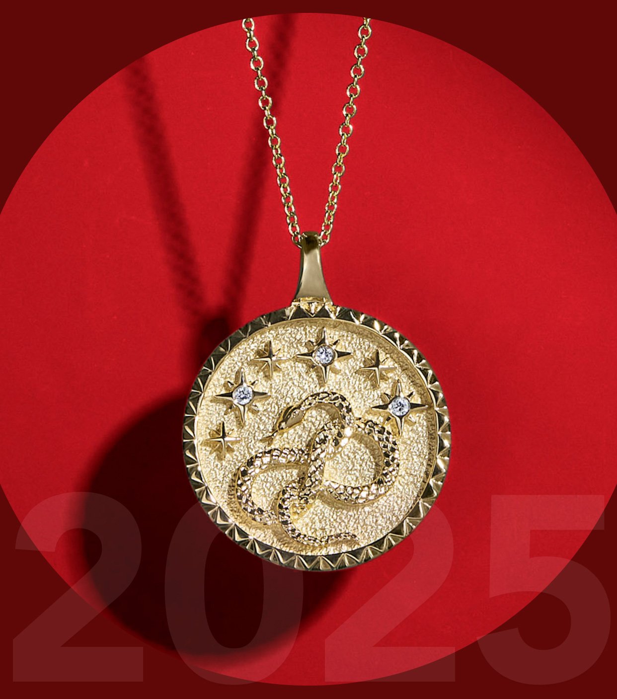 Yellow gold snake medallion necklace