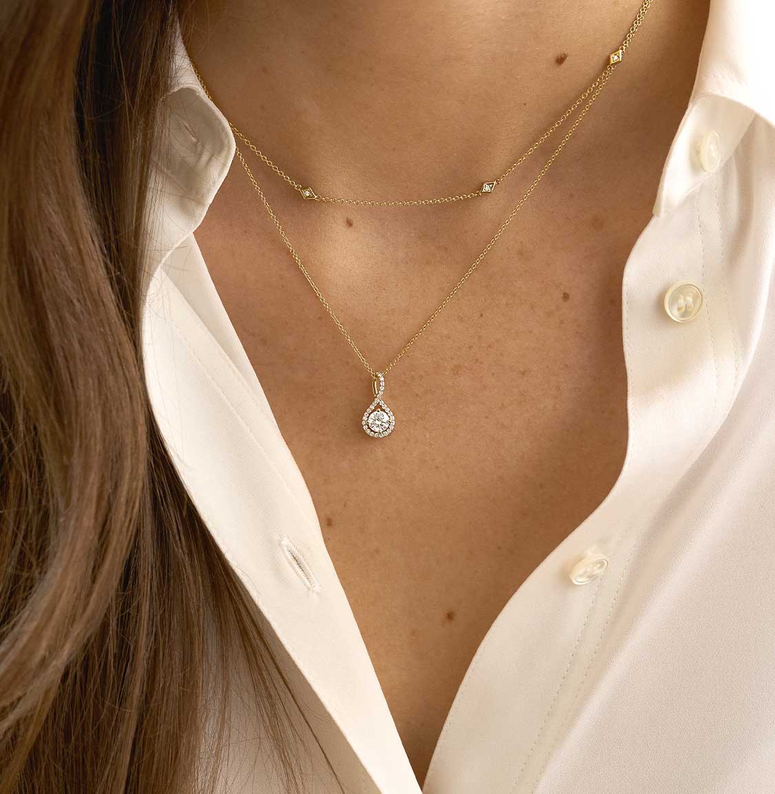 White gold layered diamond pendant