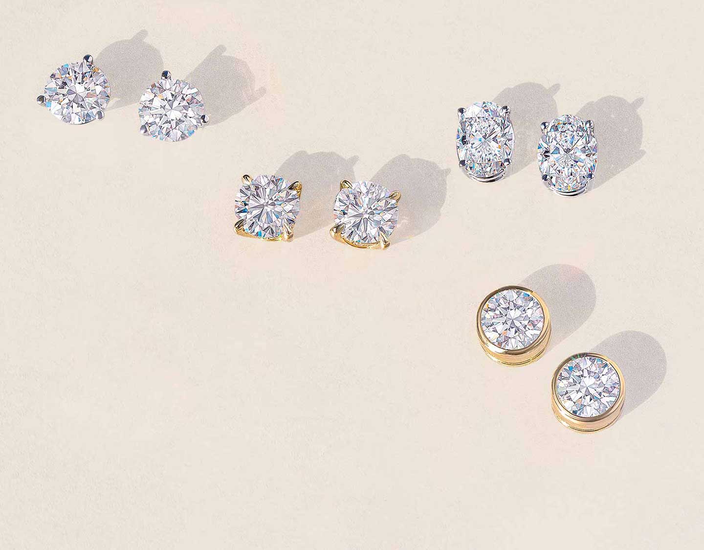 3 pairs of white gold diamond stud earrings
