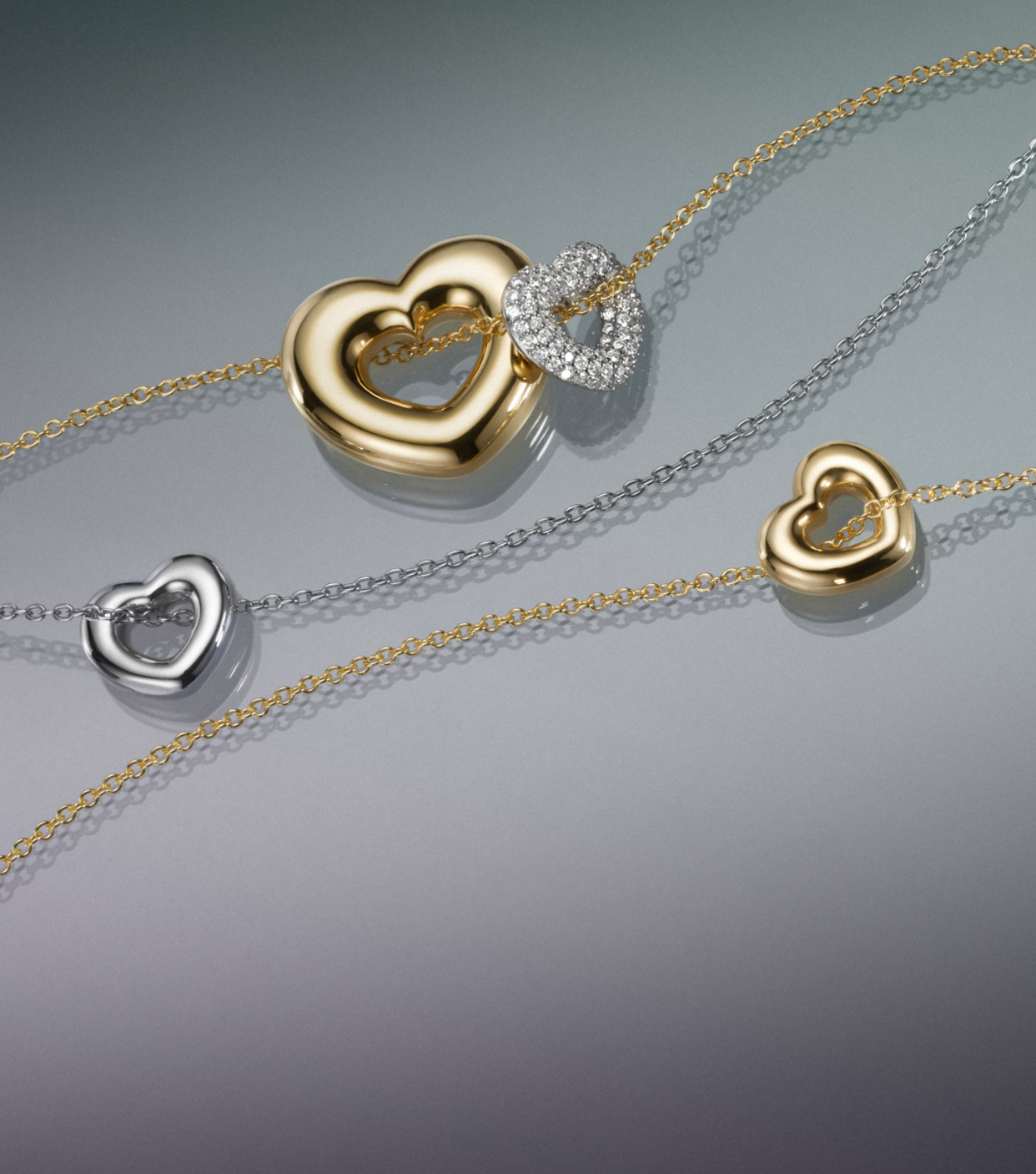 Gold, silver, and diamond heart fine jewelry.