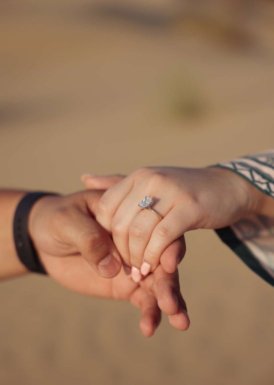 Oval diamond ring on hand