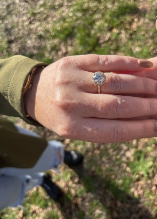 Oval diamond ring on hand