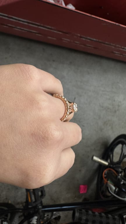 Oval diamond ring on hand