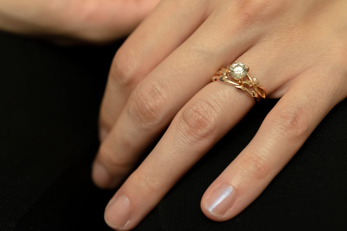 Oval diamond ring on hand