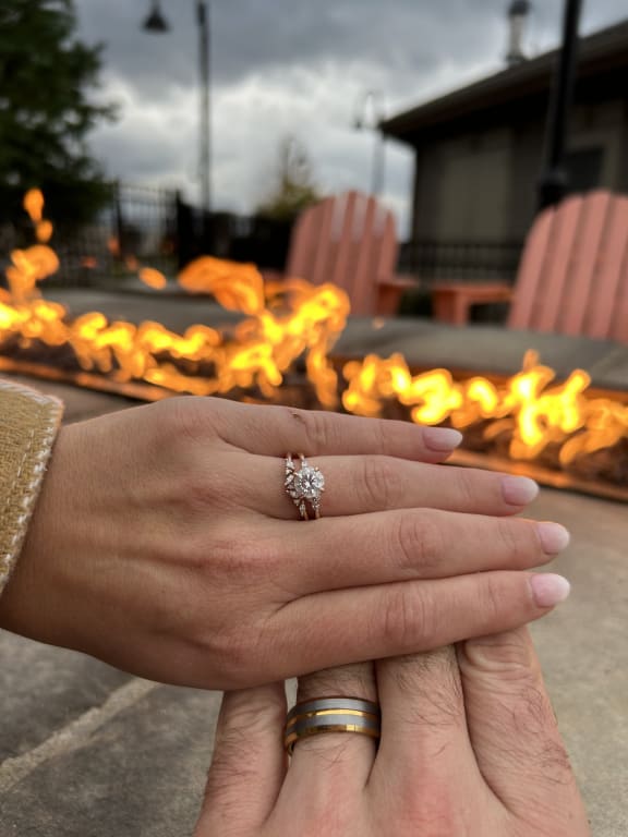 Oval diamond ring on hand