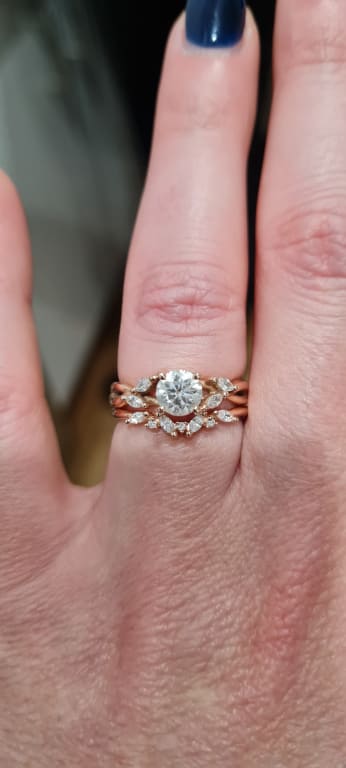 Oval diamond ring on hand