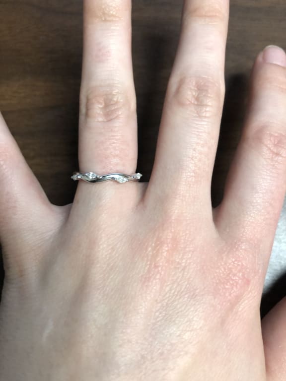 Oval diamond ring on hand