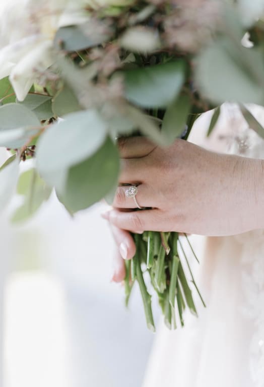 Oval diamond ring on hand