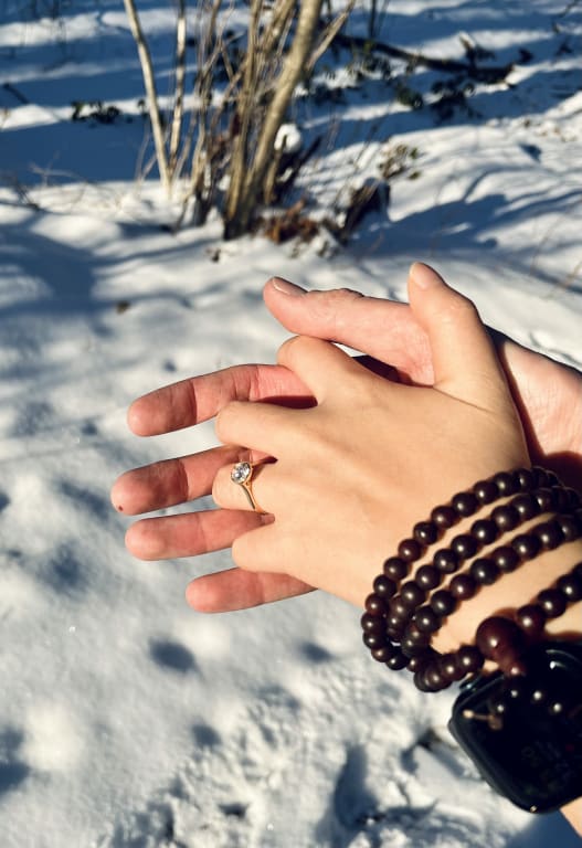 Oval diamond ring on hand