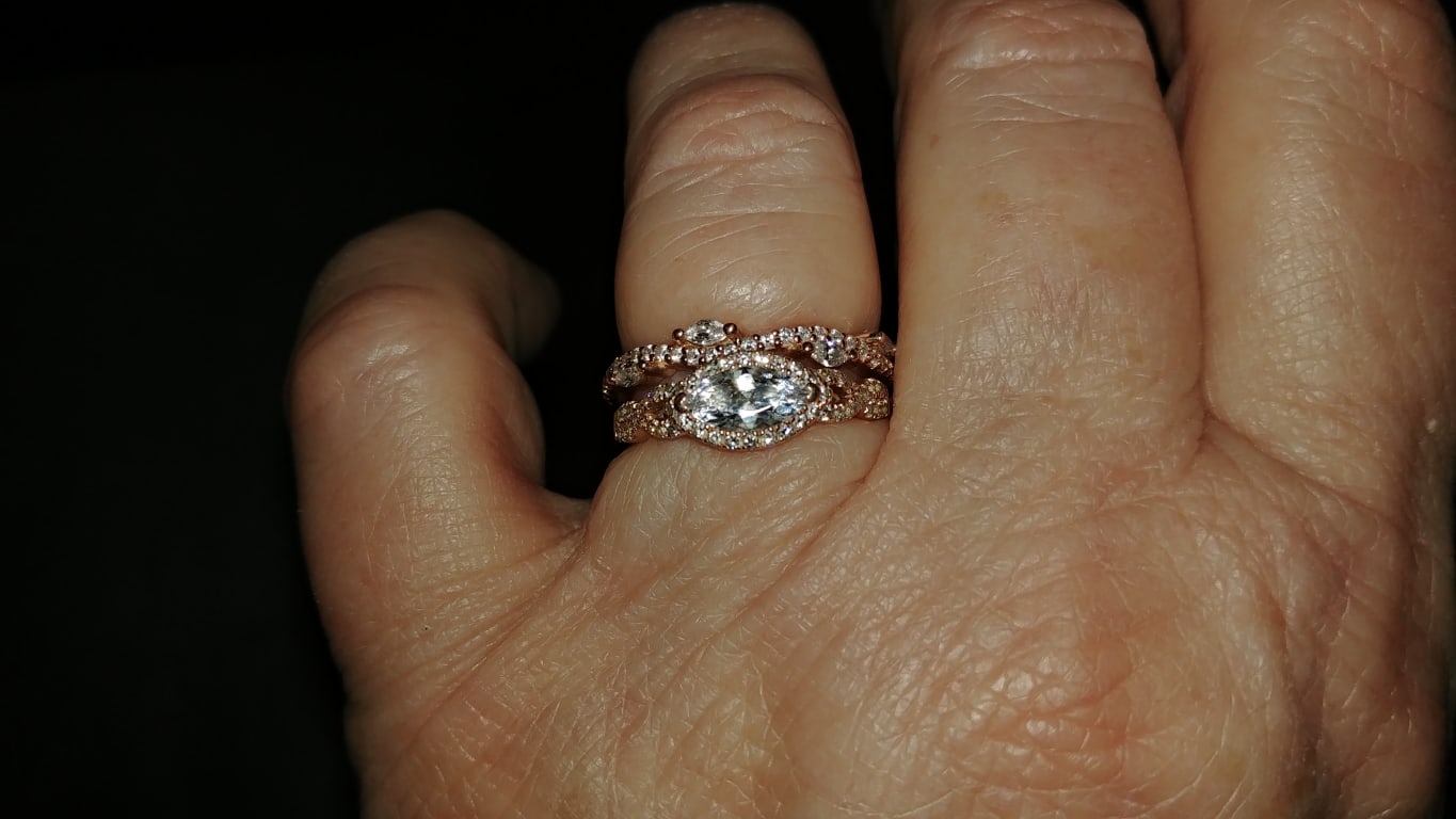 Oval diamond ring on hand