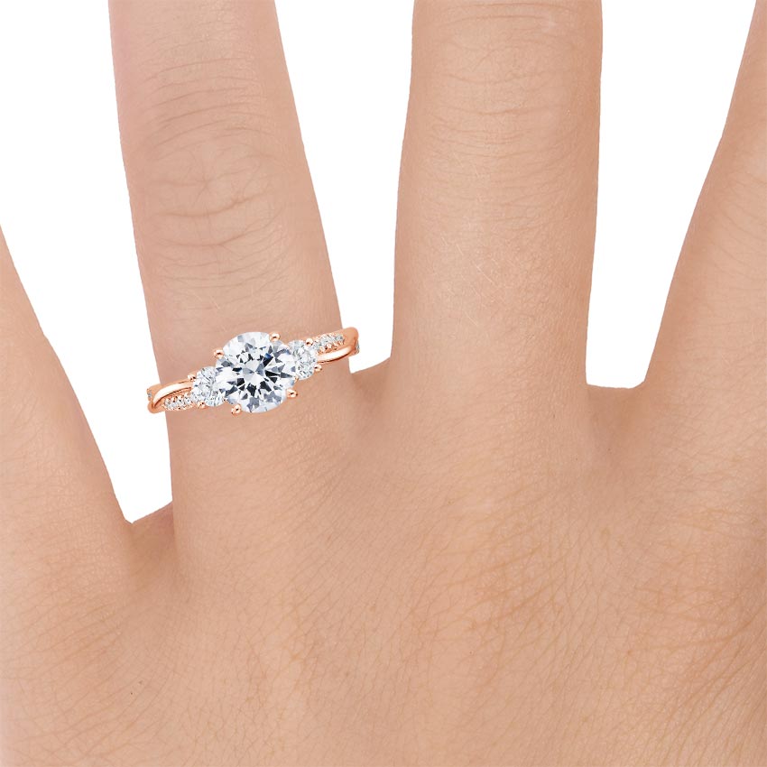 14K Rose Gold Petite Twisted Vine Three Stone Diamond Ring (2/5 ct. tw.), large zoomed in top view on a hand