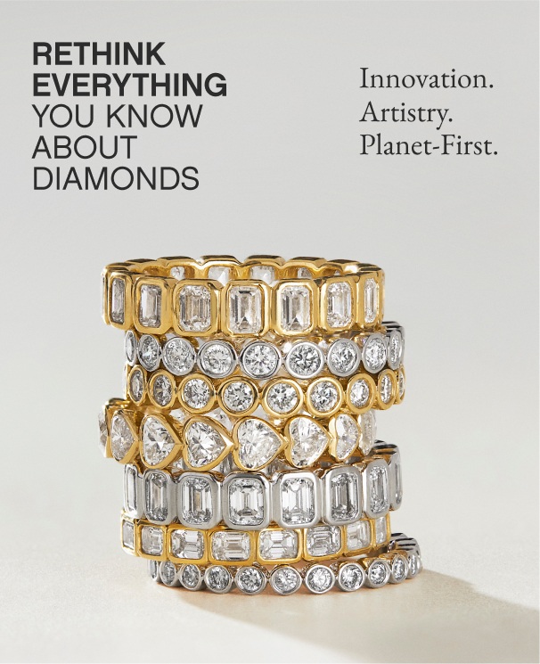 Stack of gold, diamond wedding rings.