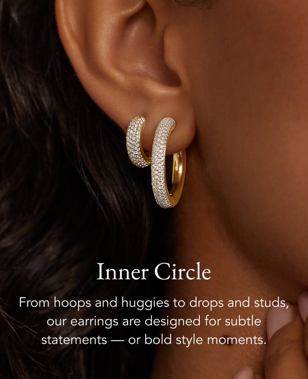 Gold and diamond hoop earrings.