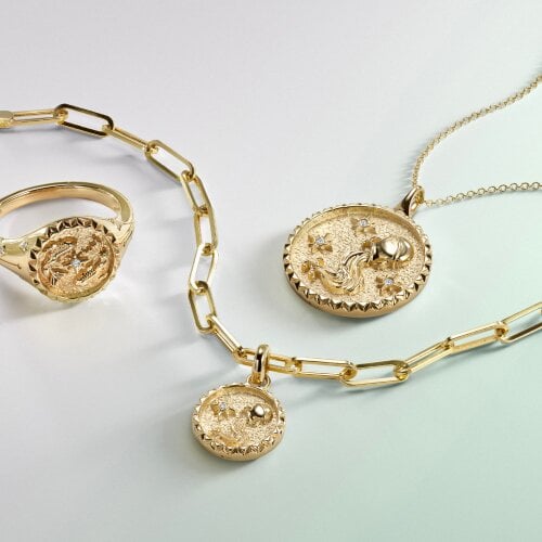 Gold zodiac fine jewelry.