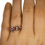The Giulia Ring, smallzoomed in top view on a hand