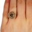 The Tahlia Ring, smallzoomed in top view on a hand
