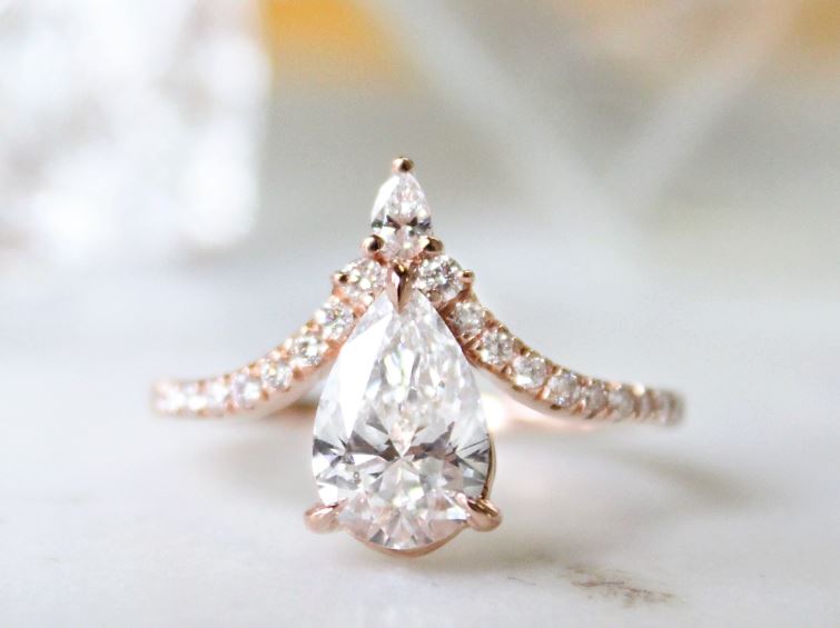 rose gold sunburst engagement ring