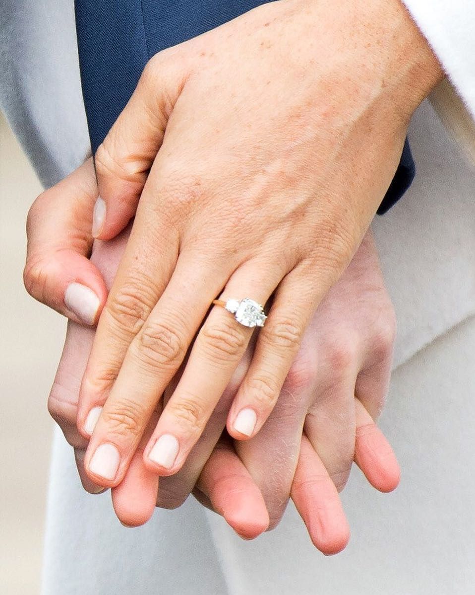 three stone engagement ring with pave band