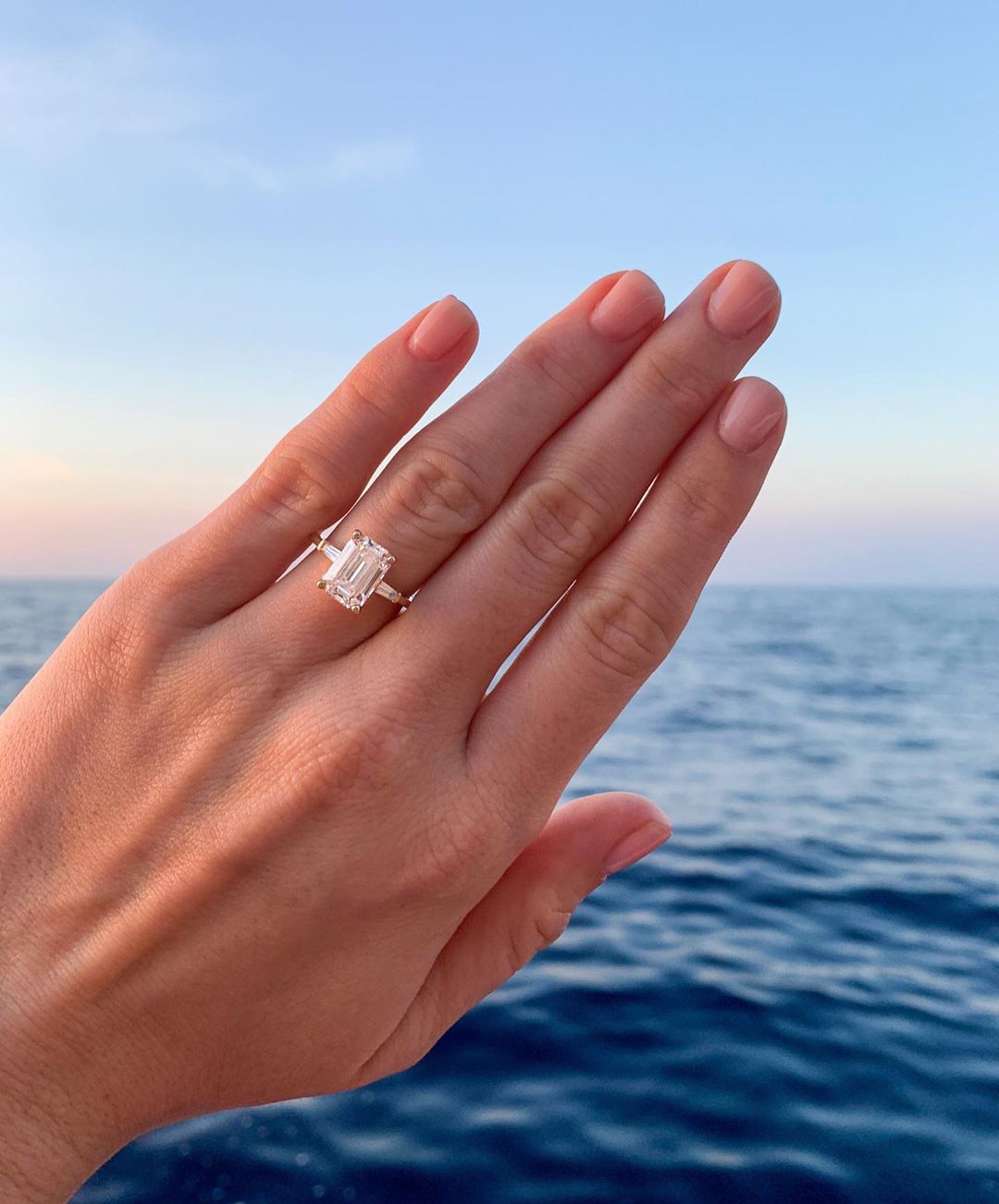 emerald ring with diamond baguettes