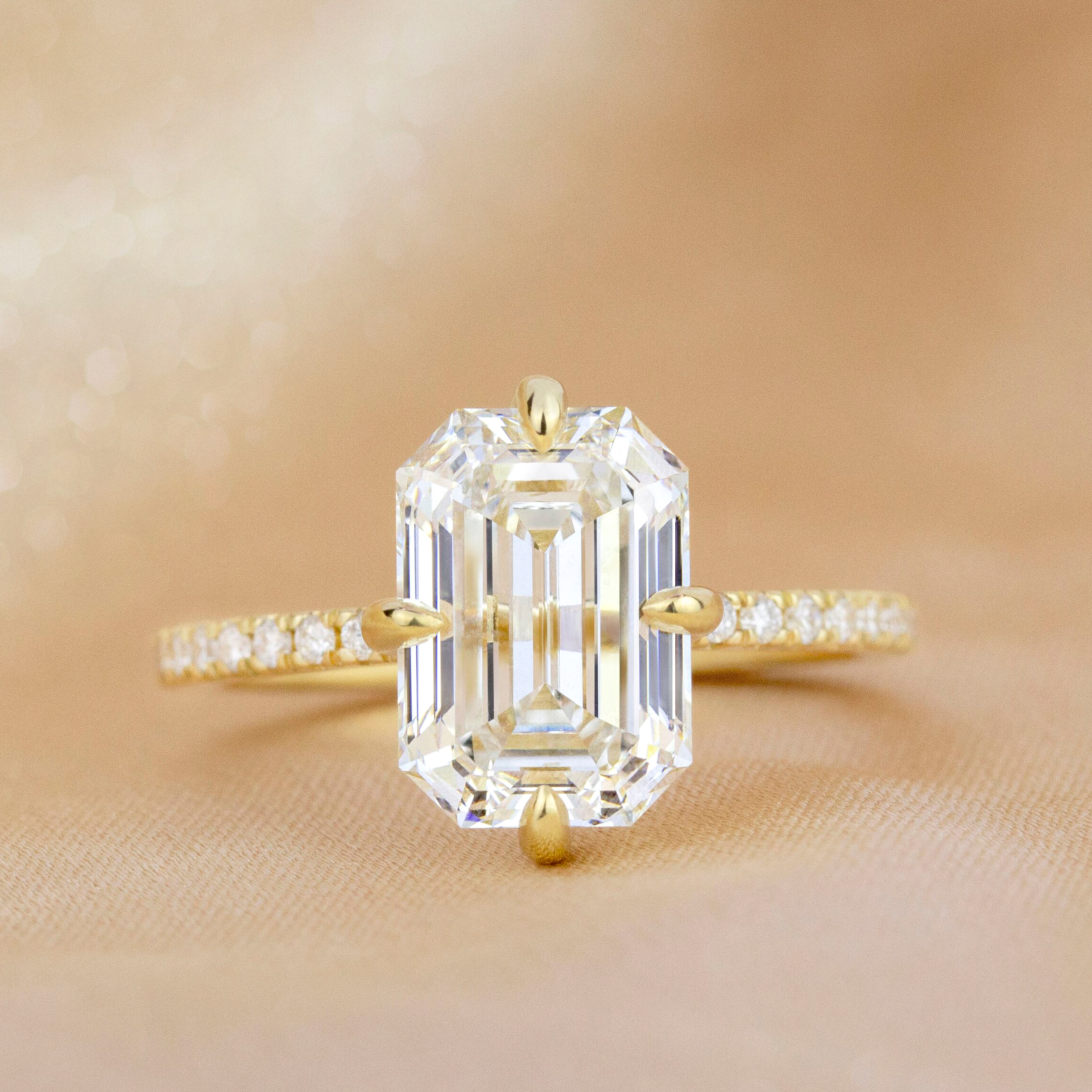 dainty emerald cut diamond ring