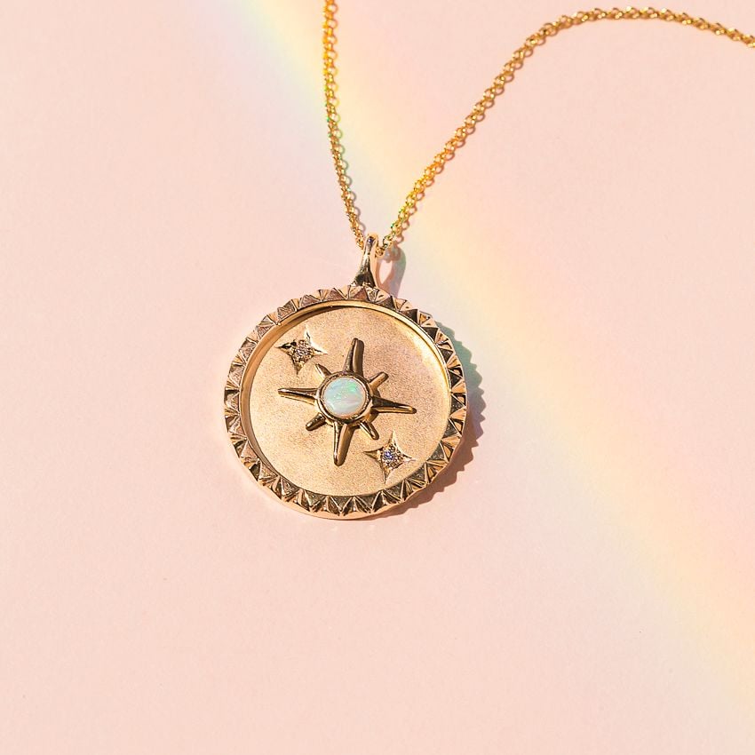 Rainbow, Stars, Moon on a Black Background From Timeless Treasures