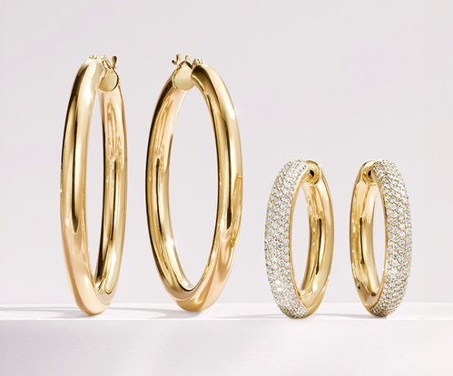 Diamond and gold hoop earrings, featured from The Tube Collection.