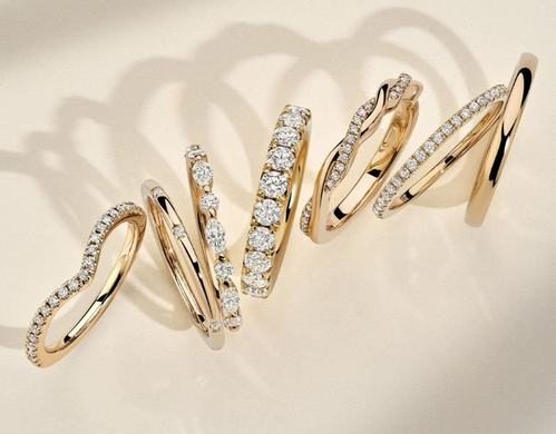 Assortment of gold diamond wedding rings.