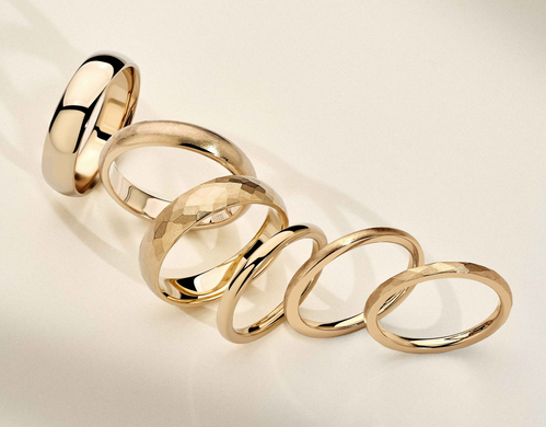 Assortment of gold wedding rings.