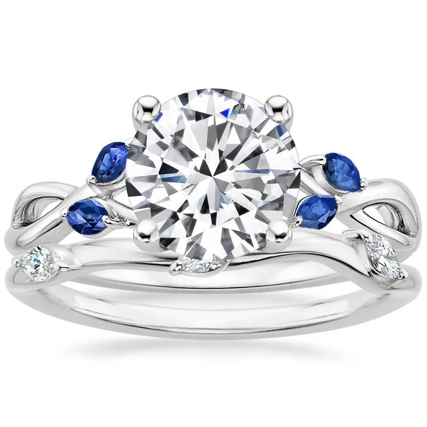 Engagement ring with blue clearance sapphire accents