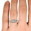 The Cadie Ring, smallzoomed in top view on a hand