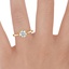 18K Yellow Gold Caliana Ring, smallzoomed in top view on a hand