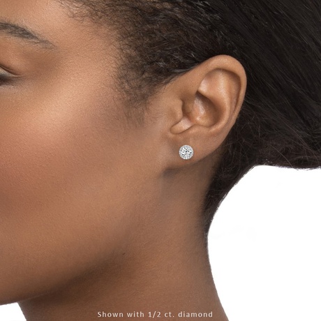 halo diamond earrings on ear