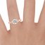 14K Rose Gold Entwined Celtic Love Knot Ring, smallzoomed in top view on a hand