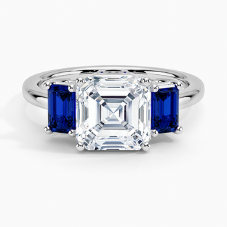 Three Stone Engagement Ring with Sapphire Side Stones