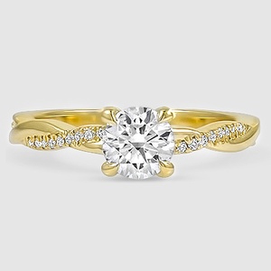 twisted gold ring with diamonds