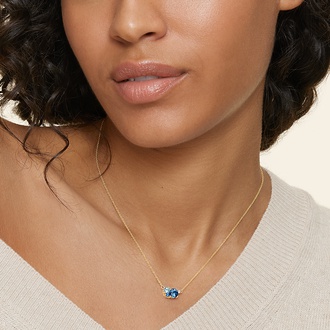 Blue Gemstone and Diamond Pendant