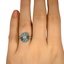 The Okalani Ring, smallzoomed in top view on a hand