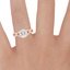 14K Rose Gold Entwined Halo Diamond Ring (1/3 ct. tw.), smallzoomed in top view on a hand