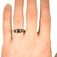 The Reeta Ring, smallzoomed in top view on a hand