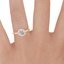 14K Rose Gold Halo Diamond Ring (1/6 ct. tw.), smallzoomed in top view on a hand