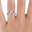 14K Rose Gold Willow Contoured Ring With Sapphire Accents, smallzoomed in top view on a hand