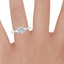 Platinum Seine Graduated Pear Diamond Ring, smallzoomed in top view on a hand