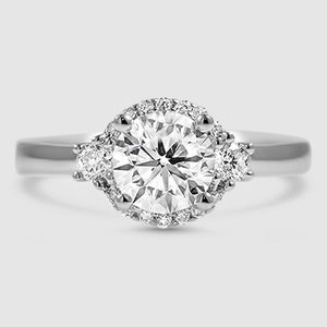 Delicate Three Stone Halo Diamond Ring | Brilliant Earth