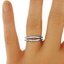 The Posie Contoured Wedding Ring Set, smallzoomed in top view on a hand