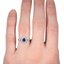 The Elike Ring, smallzoomed in top view on a hand