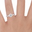Platinum Esme Ring, smallzoomed in top view on a hand