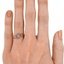 The Cleora Ring, smallzoomed in top view on a hand