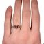 The Odalys Ring, smallzoomed in top view on a hand