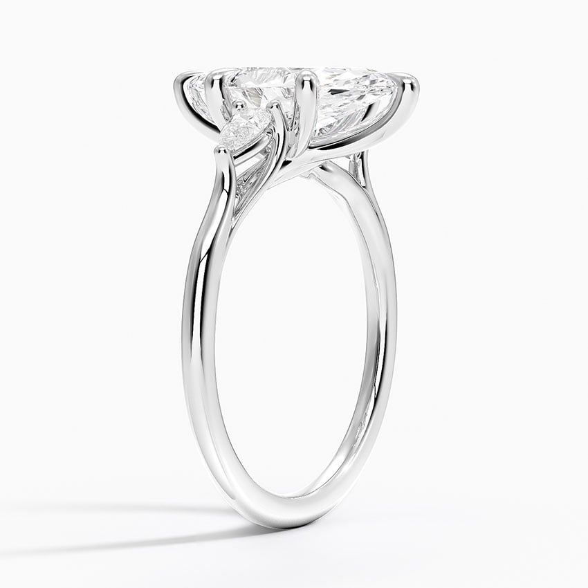 Platinum Delilah Three Stone Pear Diamond Ring (1/5 ct. tw.)