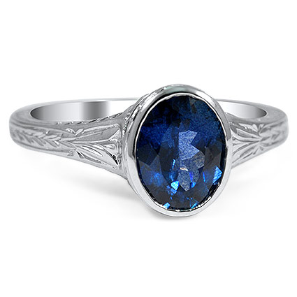 Custom Oval Sapphire Bezel Ring with Hand Engraving